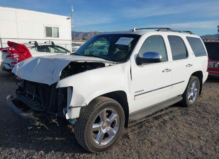 Photo 2 of 2013 Chevrolet Tahoe LTZ (VIN 1GNSCCE04DR123691)