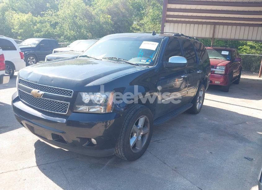 Photo 2 of 2012 Chevrolet Tahoe LTZ (VIN 1GNSCCE07CR283675)