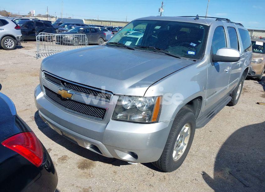 Photo 2 of 2012 Chevrolet Suburban 1500 LS (VIN 1GNSCHE02CR239144)