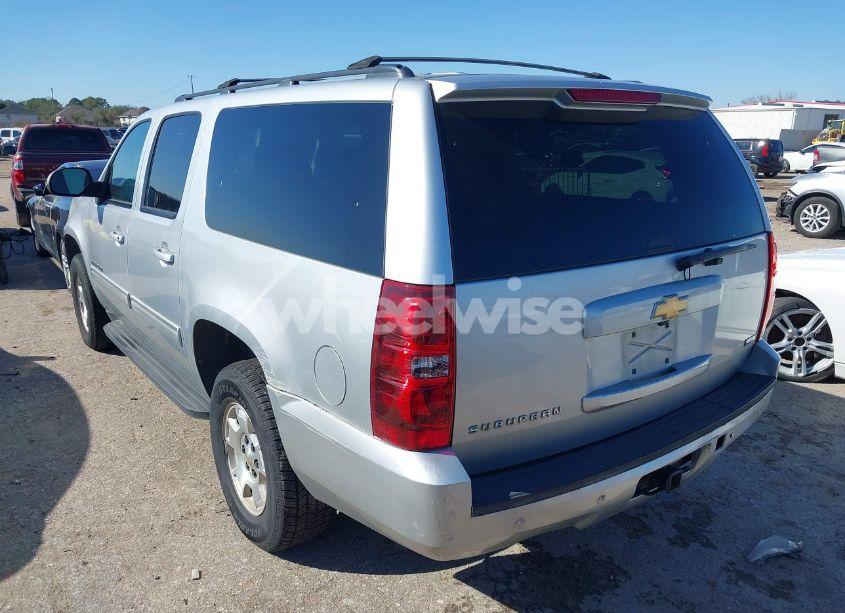 Photo 3 of 2012 Chevrolet Suburban 1500 LS (VIN 1GNSCHE02CR239144)