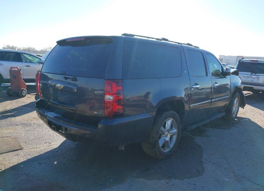 Photo 4 of 2011 Chevrolet Suburban 1500 LT1 (VIN 1GNSCJE01BR299003)