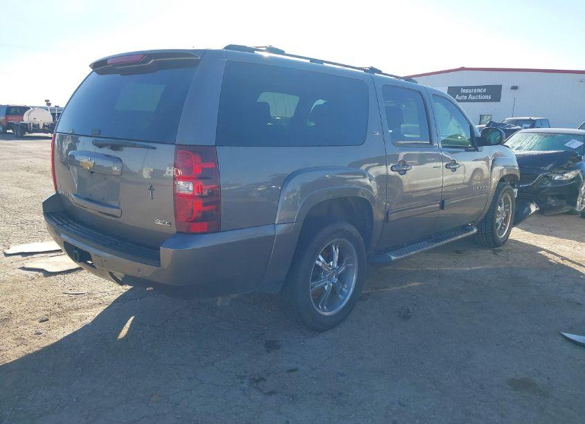 Photo 4 of 2012 Chevrolet Suburban 1500 LT (VIN 1GNSCJE06CR303158)