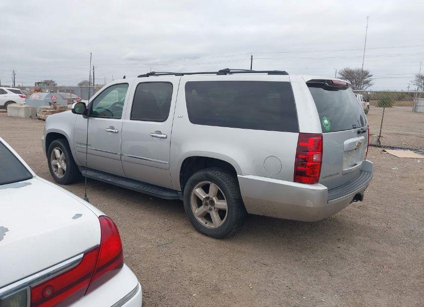 Photo 3 of 2011 Chevrolet Suburban 1500 LTZ (VIN 1GNSCKE01BR196931)