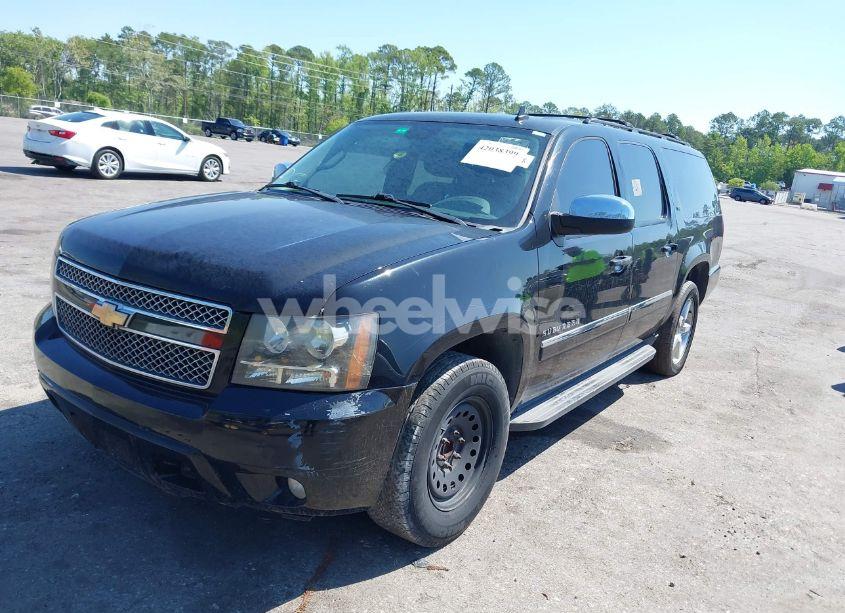 Photo 2 of 2011 Chevrolet Suburban 1500 LTZ (VIN 1GNSCKE01BR275919)
