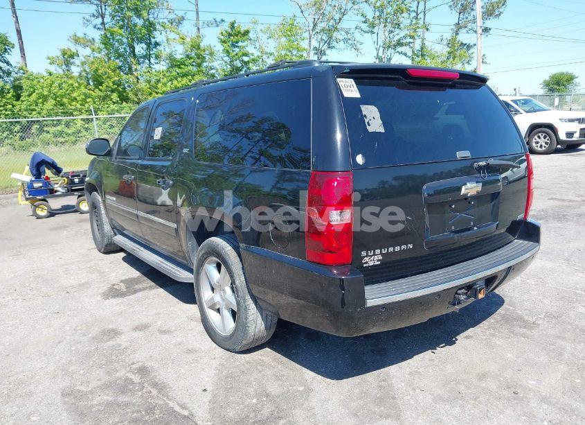 Photo 3 of 2011 Chevrolet Suburban 1500 LTZ (VIN 1GNSCKE01BR275919)