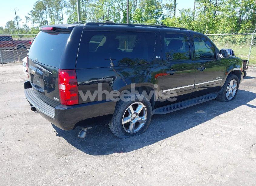 Photo 4 of 2011 Chevrolet Suburban 1500 LTZ (VIN 1GNSCKE01BR275919)