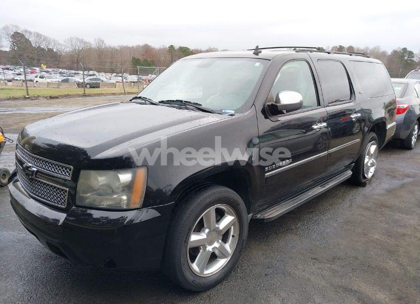 Photo 2 of 2011 Chevrolet Suburban 1500 LTZ (VIN 1GNSCKE02BR206544)