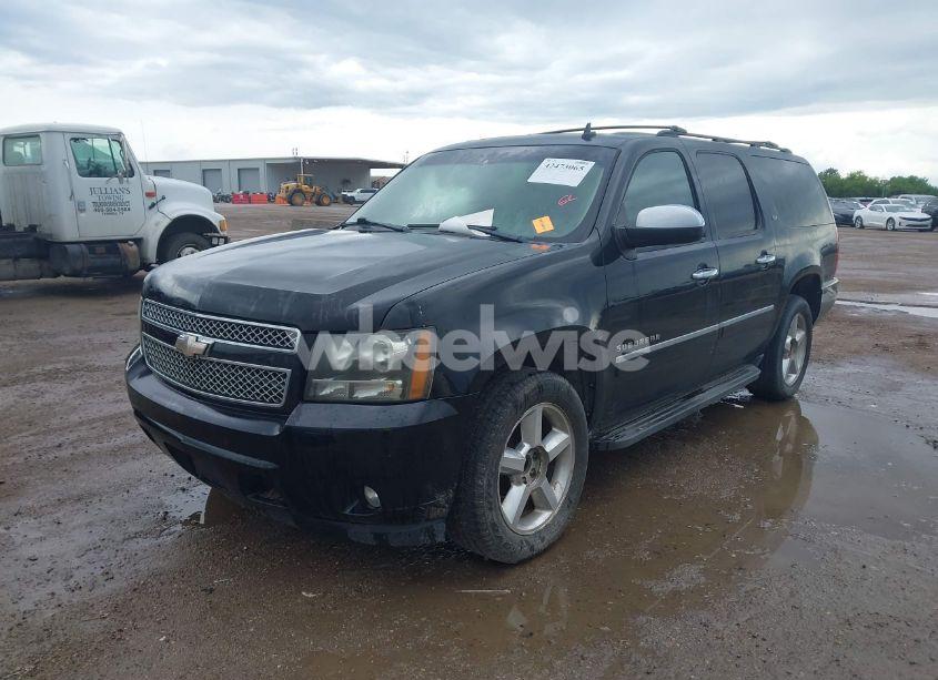 Photo 2 of 2011 Chevrolet Suburban 1500 LTZ (VIN 1GNSCKE02BR370652)