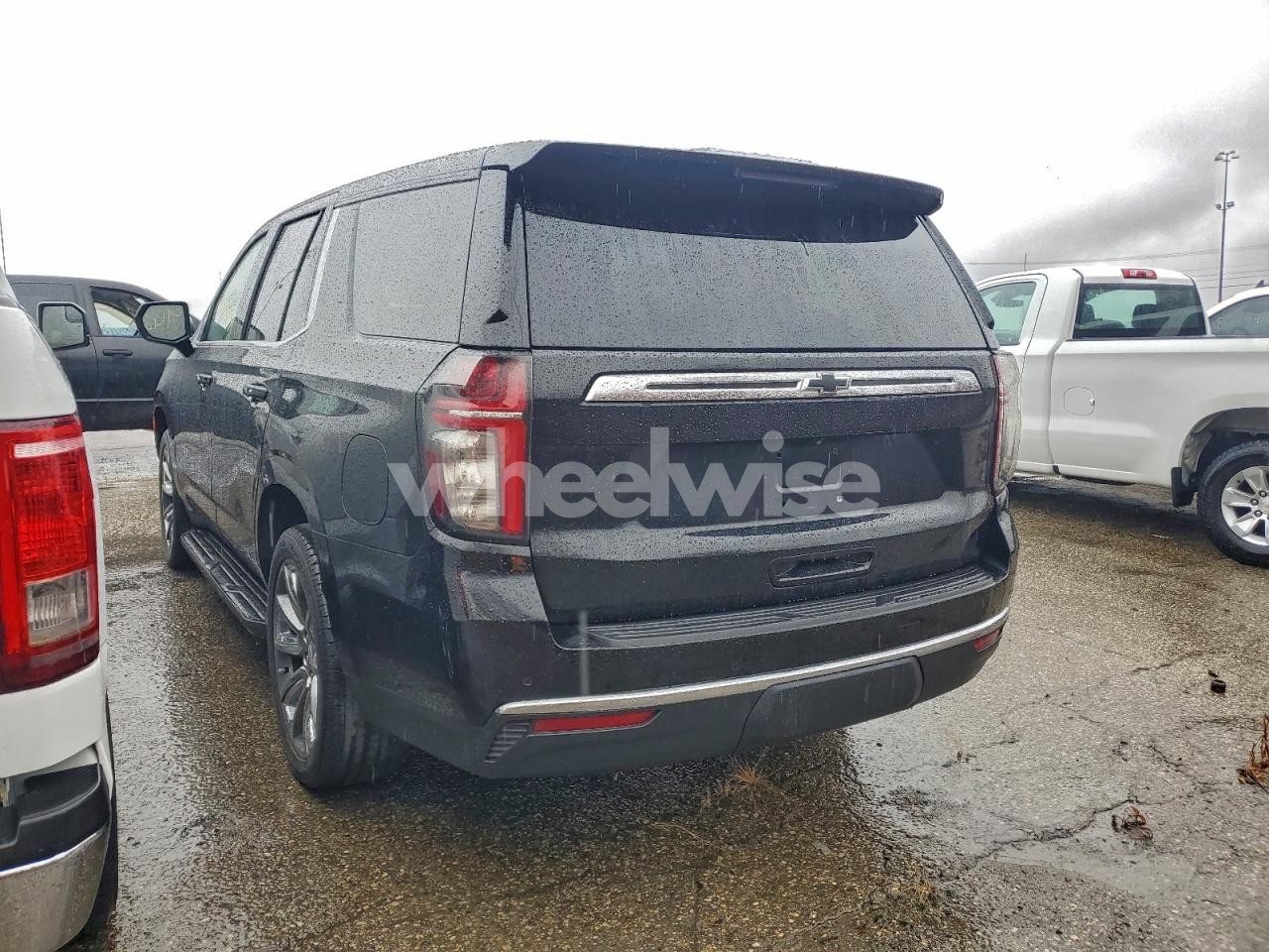 Photo 2 of 2021 CHEVROLET TAHOE C1500 (VIN 1GNSCLED3MR339647)