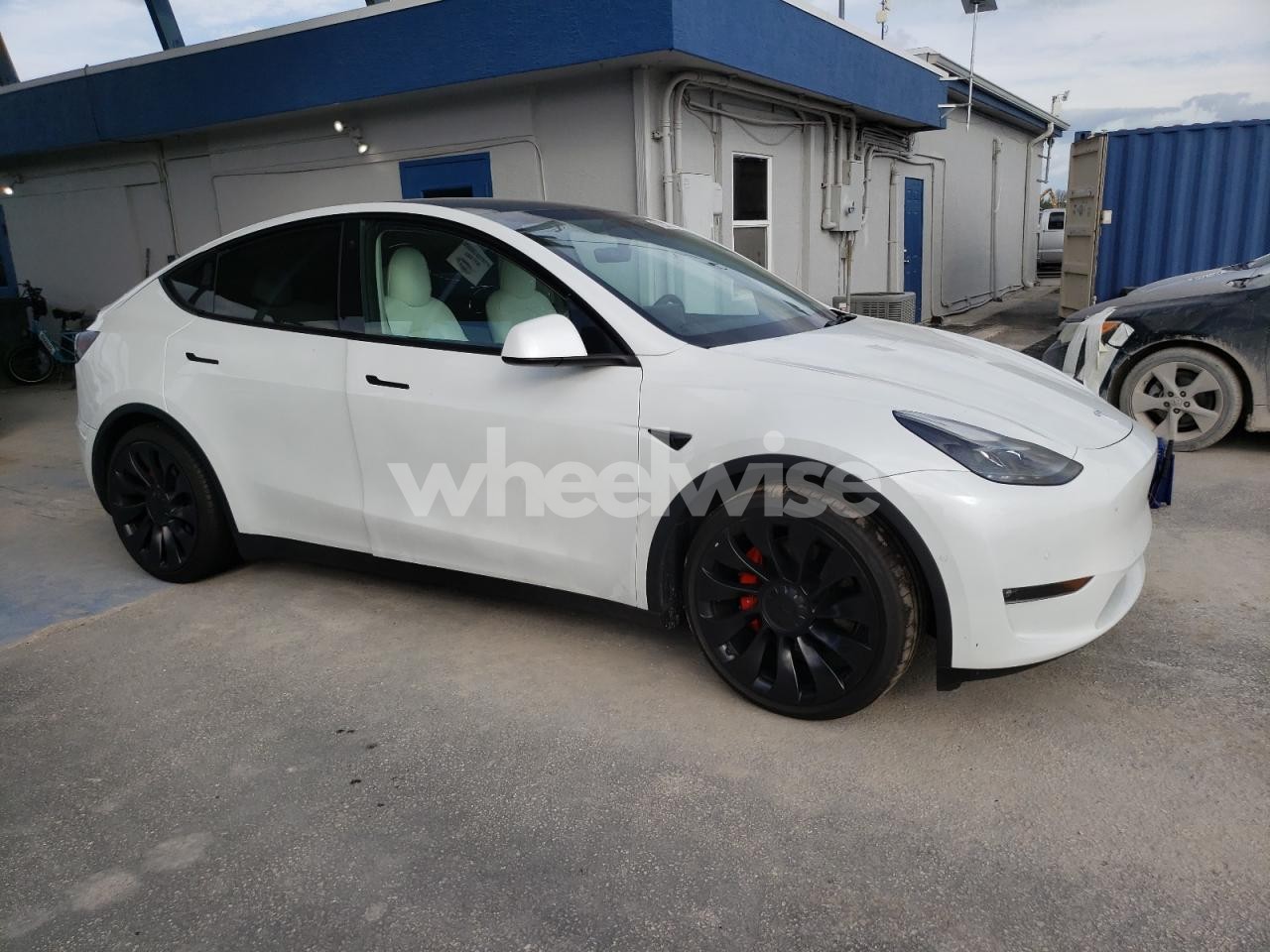 Photo 4 of 2022 TESLA MODEL Y (VIN 1GNSCMKD4RR372433)