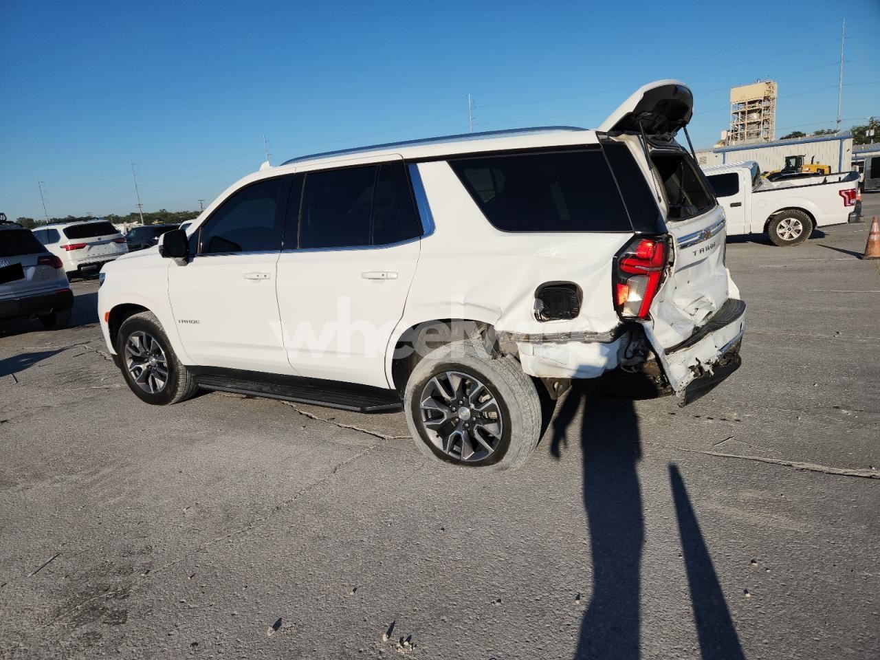 Photo 2 of 2023 CHEVROLET TAHOE C1500 LT (VIN 1GNSCNKD0PR259209)