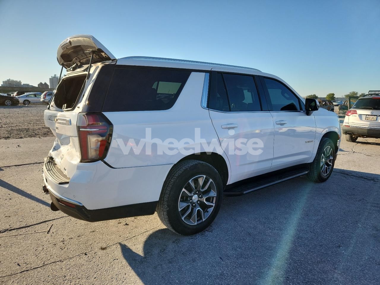 Photo 3 of 2023 CHEVROLET TAHOE C1500 LT (VIN 1GNSCNKD0PR259209)
