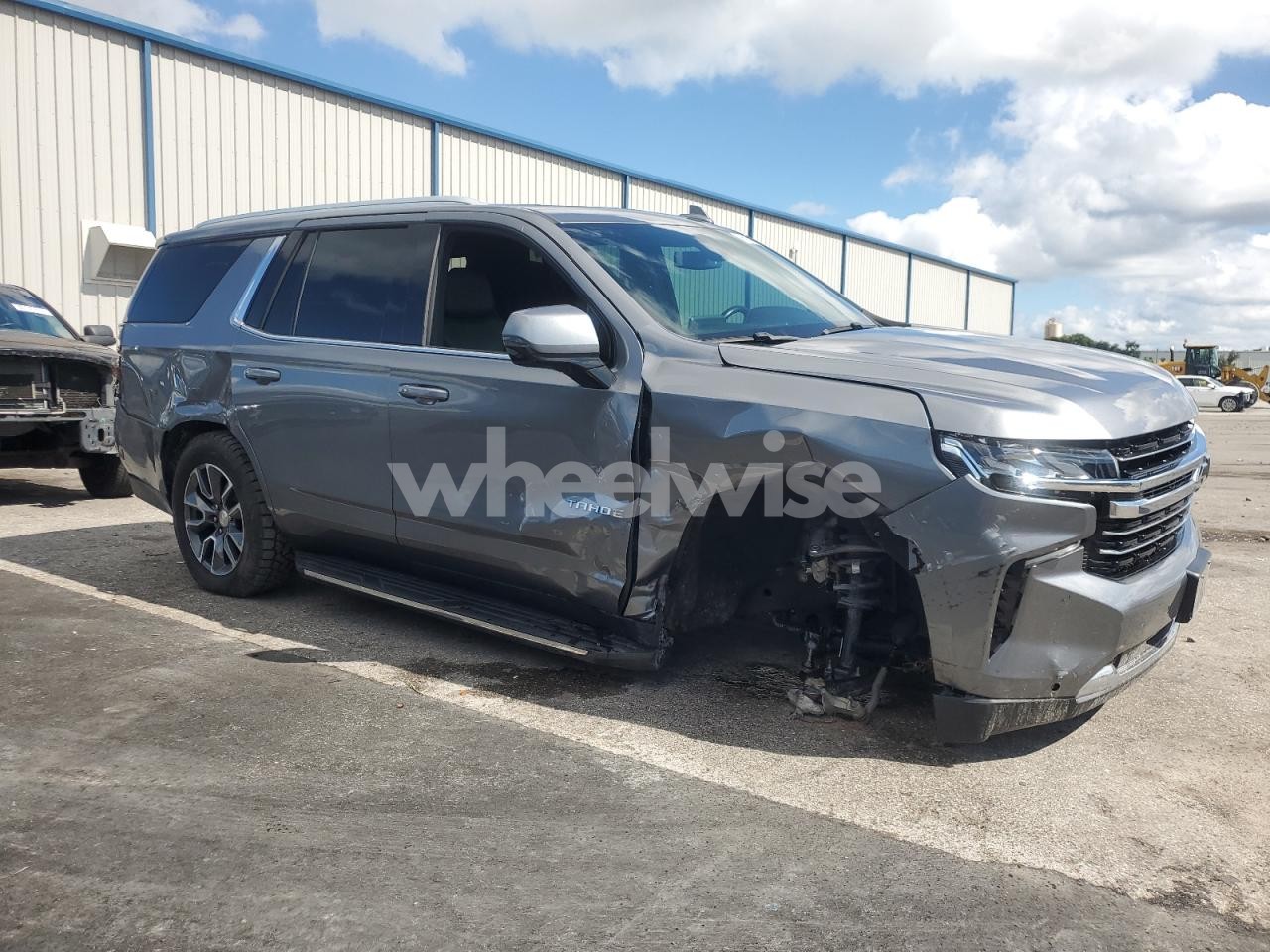 Photo 4 of 2021 CHEVROLET TAHOE C1500 LT (VIN 1GNSCNKD9MR120501)