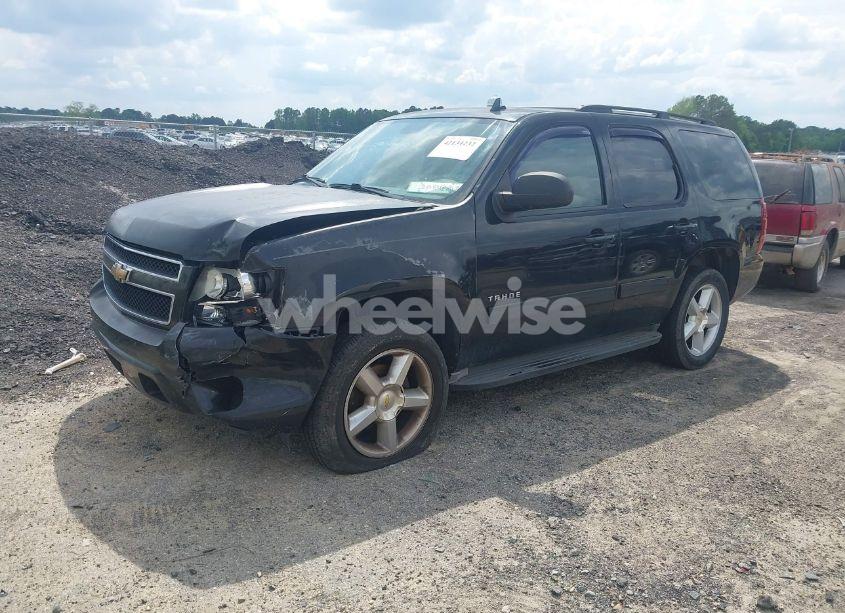 Photo 2 of 2011 Chevrolet Tahoe LS (VIN 1GNSKAE07BR100426)