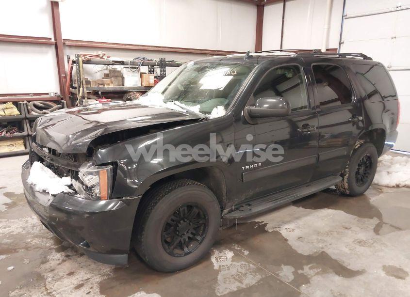 Photo 2 of 2011 Chevrolet Tahoe LS (VIN 1GNSKAE09BR338827)