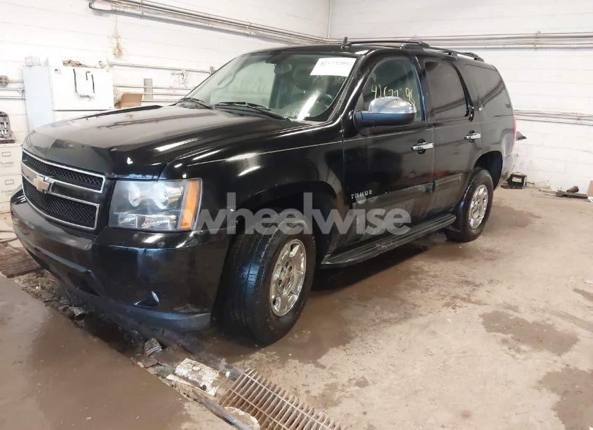 Photo 2 of 2011 Chevrolet Tahoe LT (VIN 1GNSKBE06BR303636)