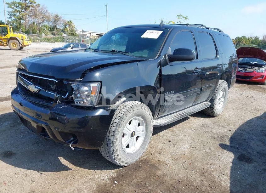 Photo 2 of 2011 Chevrolet Tahoe LT (VIN 1GNSKBE06BR370947)