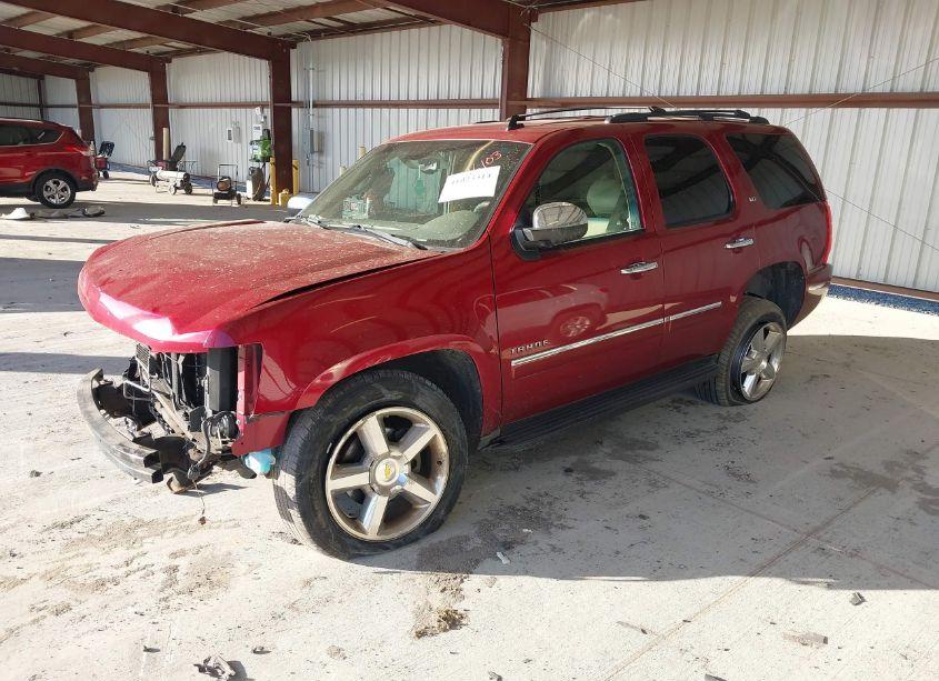 Photo 2 of 2011 Chevrolet Tahoe LTZ (VIN 1GNSKCE02BR272701)