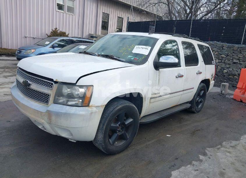 Photo 2 of 2011 Chevrolet Tahoe LTZ (VIN 1GNSKCE03BR116943)