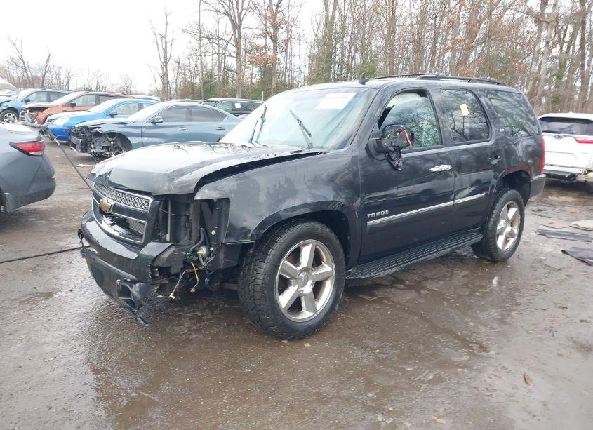 Photo 2 of 2011 Chevrolet Tahoe LTZ (VIN 1GNSKCE03BR341265)