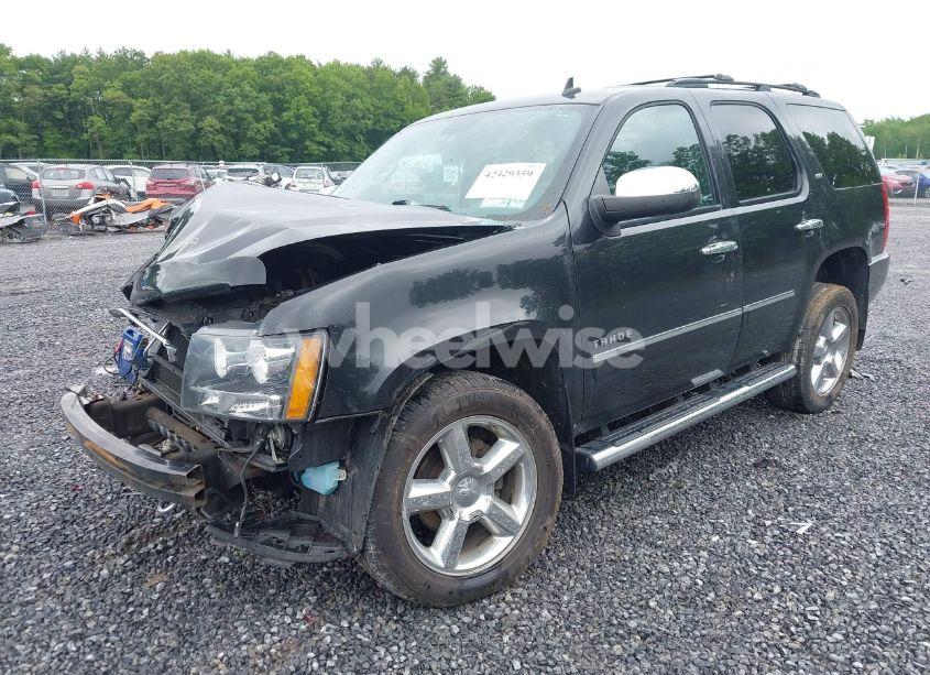 Photo 2 of 2012 Chevrolet Tahoe LTZ (VIN 1GNSKCE03CR291002)