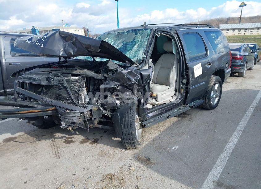 Photo 2 of 2011 Chevrolet Tahoe LTZ (VIN 1GNSKCE07BR109882)