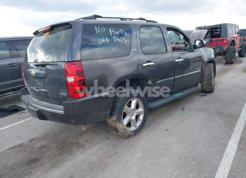 Photo 4 of 2011 Chevrolet Tahoe LTZ (VIN 1GNSKCE07BR109882)