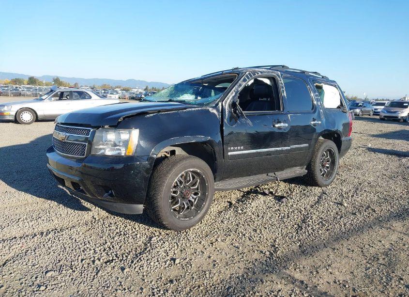 Photo 2 of 2011 Chevrolet Tahoe LTZ (VIN 1GNSKCE08BR143250)