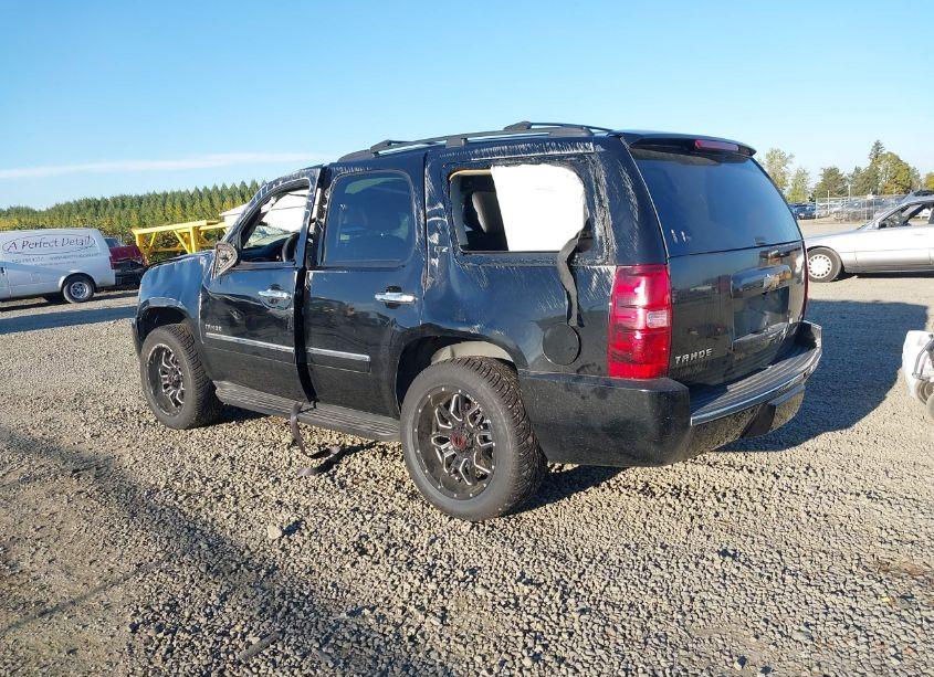 Photo 3 of 2011 Chevrolet Tahoe LTZ (VIN 1GNSKCE08BR143250)