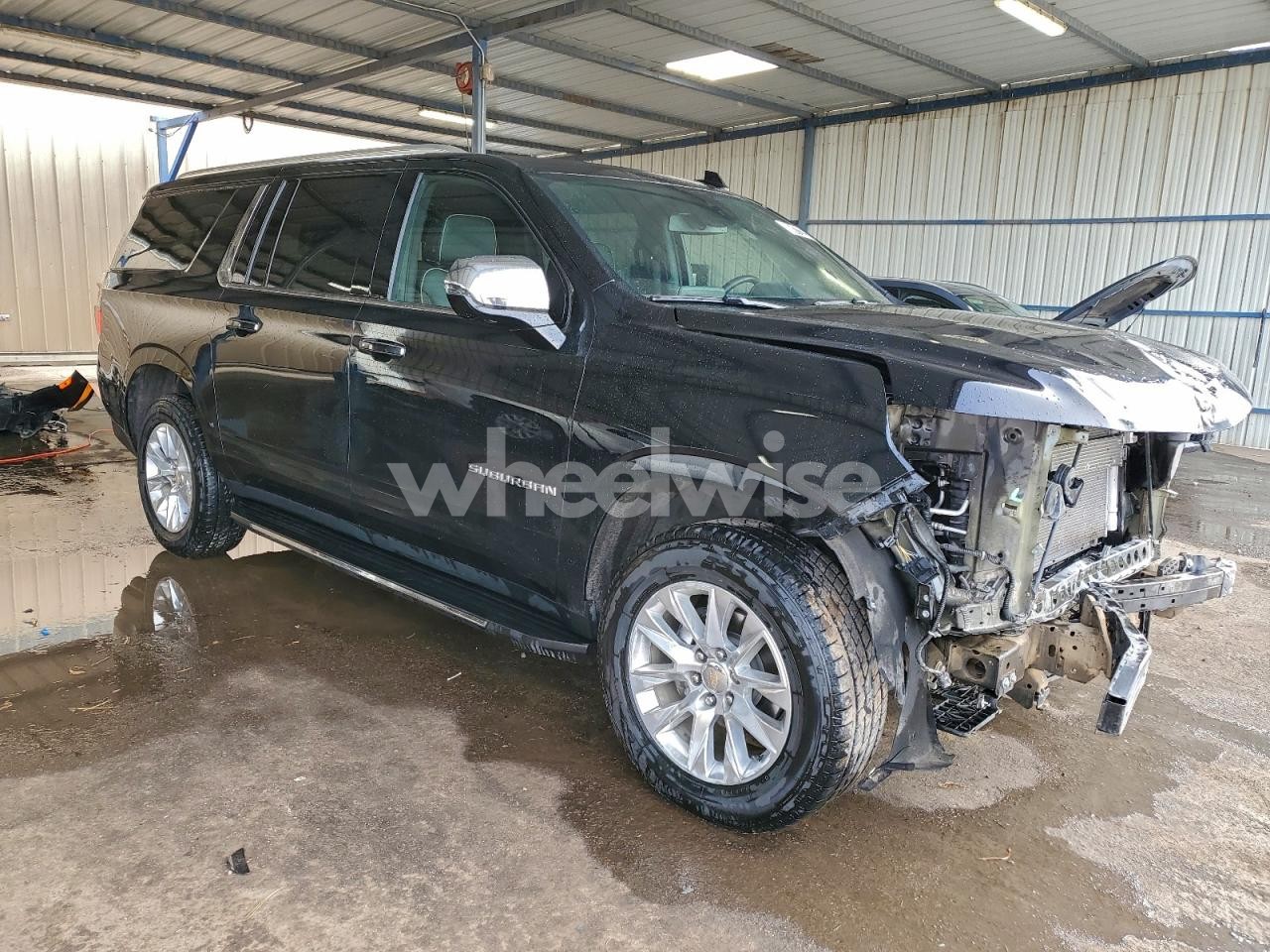 Photo 4 of 2024 CHEVROLET SUBURBAN K1500 PREMIER (VIN 1GNSKFKDXRR278703)