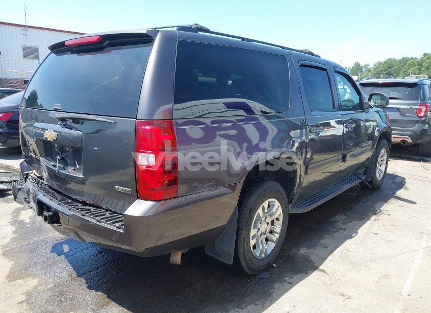 Photo 4 of 2011 Chevrolet Suburban 1500 LS (VIN 1GNSKHE30BR170658)