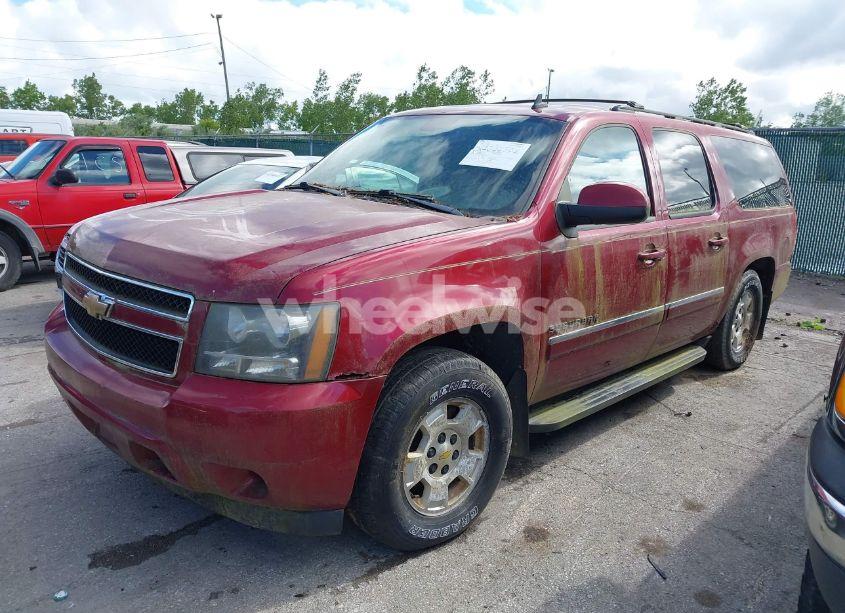 Photo 2 of 2011 Chevrolet Suburban 1500 LS (VIN 1GNSKHE33BR267353)