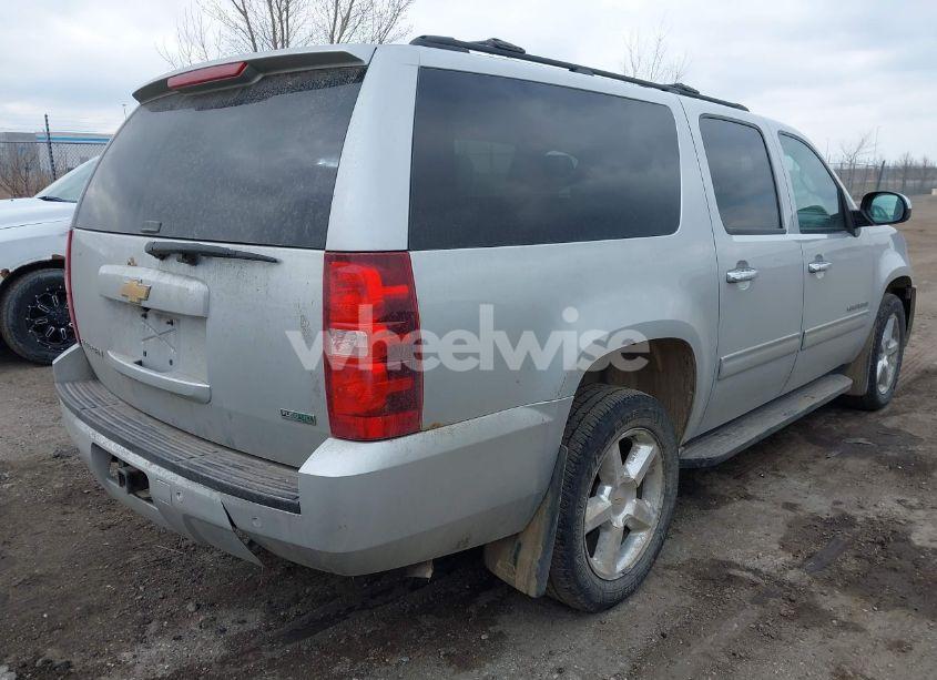 Photo 4 of 2011 Chevrolet Suburban 1500 LS (VIN 1GNSKHE37BR303898)