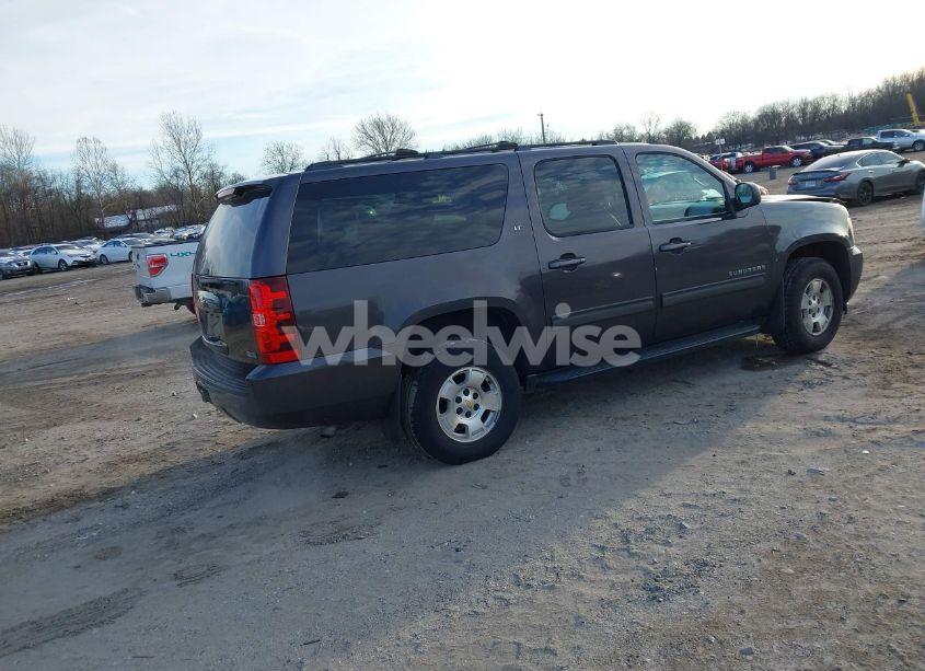 Photo 4 of 2011 Chevrolet Suburban 1500 LT1 (VIN 1GNSKJE39BR296248)