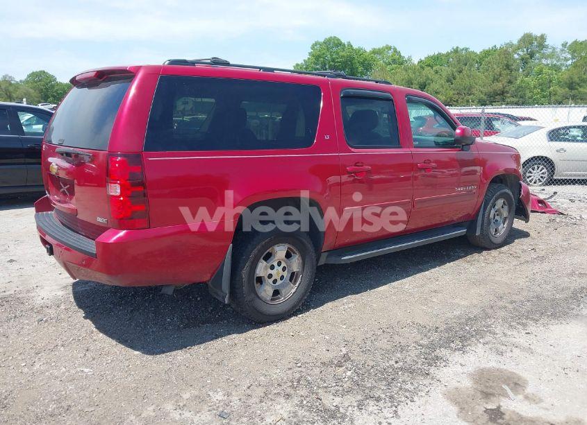Photo 4 of 2012 Chevrolet Suburban 1500 LT (VIN 1GNSKJE7XCR239853)