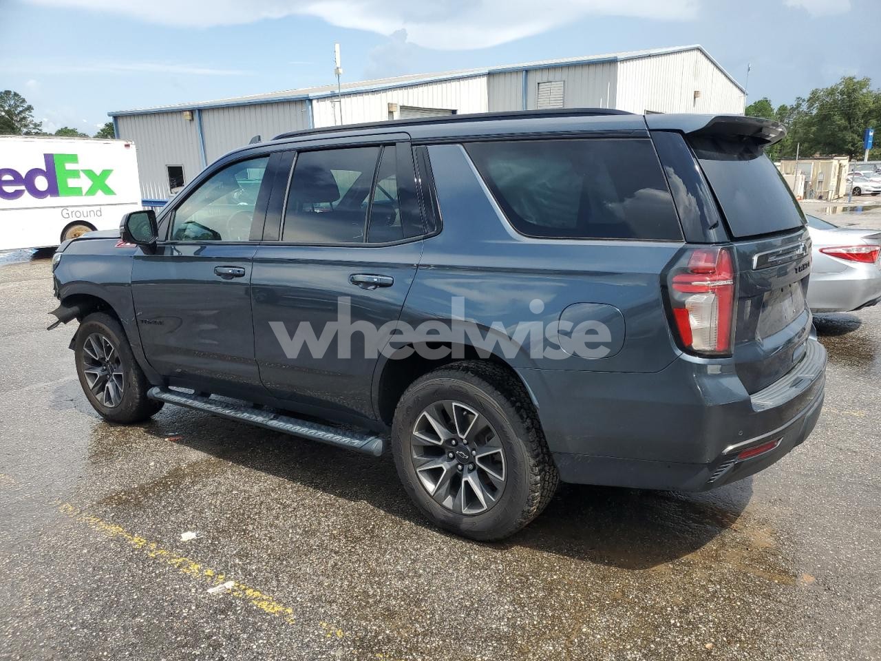 Photo 2 of 2021 CHEVROLET TAHOE K1500 Z71 (VIN 1GNSKPKD1MR222776)