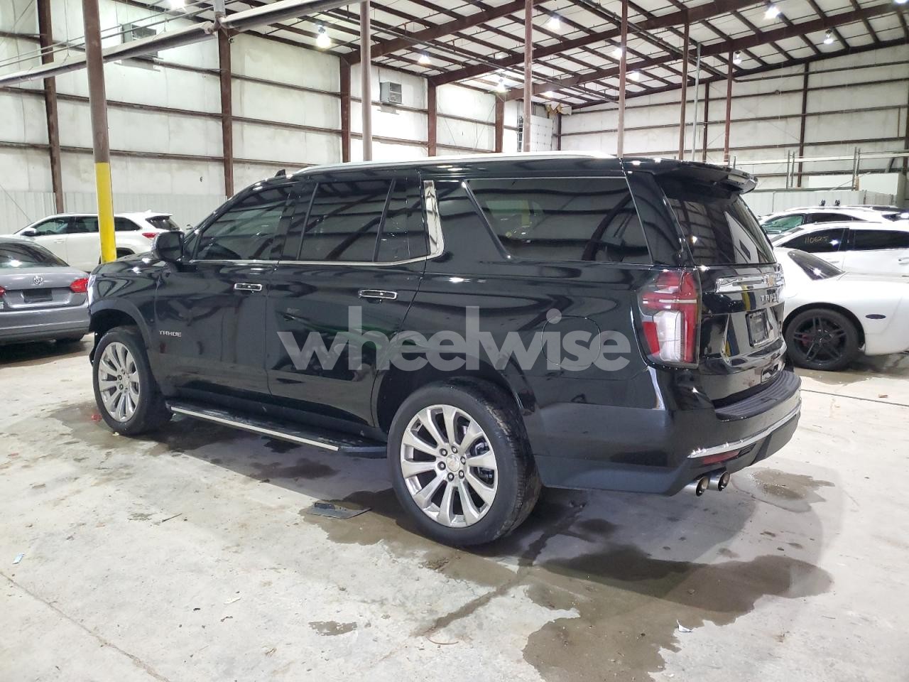 Photo 2 of 2023 CHEVROLET TAHOE K1500 PREMIER (VIN 1GNSKSKD7PR206850)