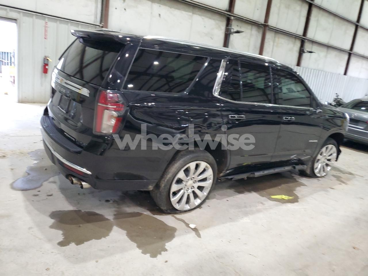 Photo 3 of 2023 CHEVROLET TAHOE K1500 PREMIER (VIN 1GNSKSKD7PR206850)