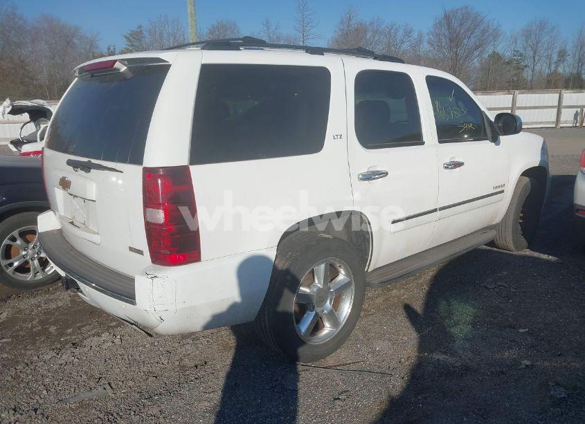 Photo 4 of 2010 Chevrolet Tahoe LTZ (VIN 1GNUKCE01AR197786)