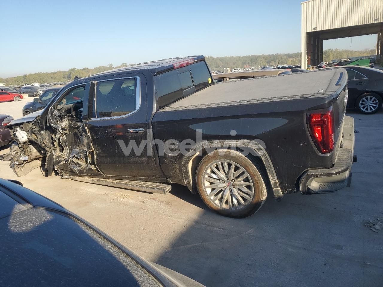 Photo 2 of 2020 GMC SIERRA K1500 DENALI (VIN 1GTU9FEL1LZ273347)