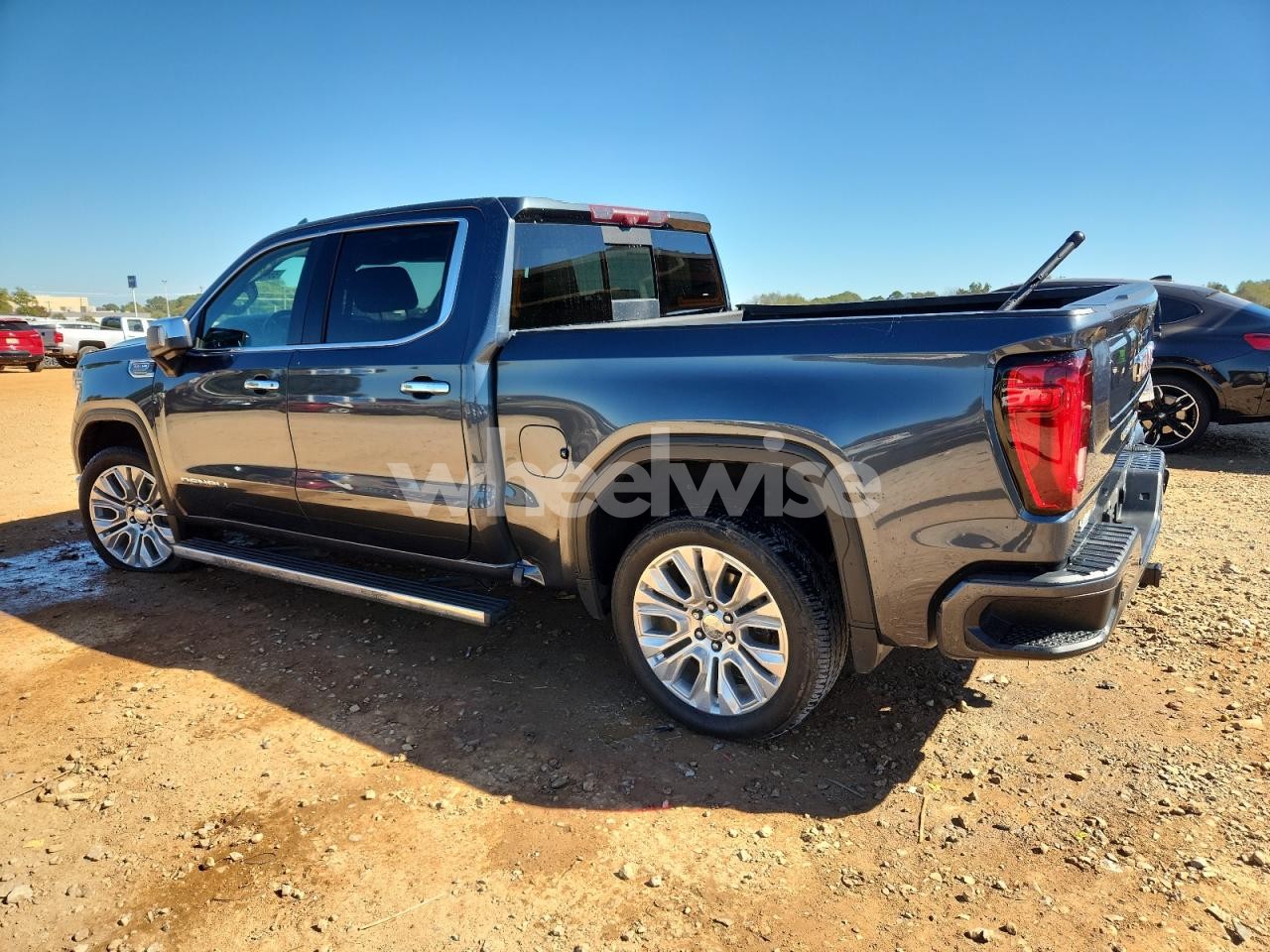 Photo 2 of 2021 GMC SIERRA K1500 DENALI (VIN 1GTU9FEL6MZ264449)