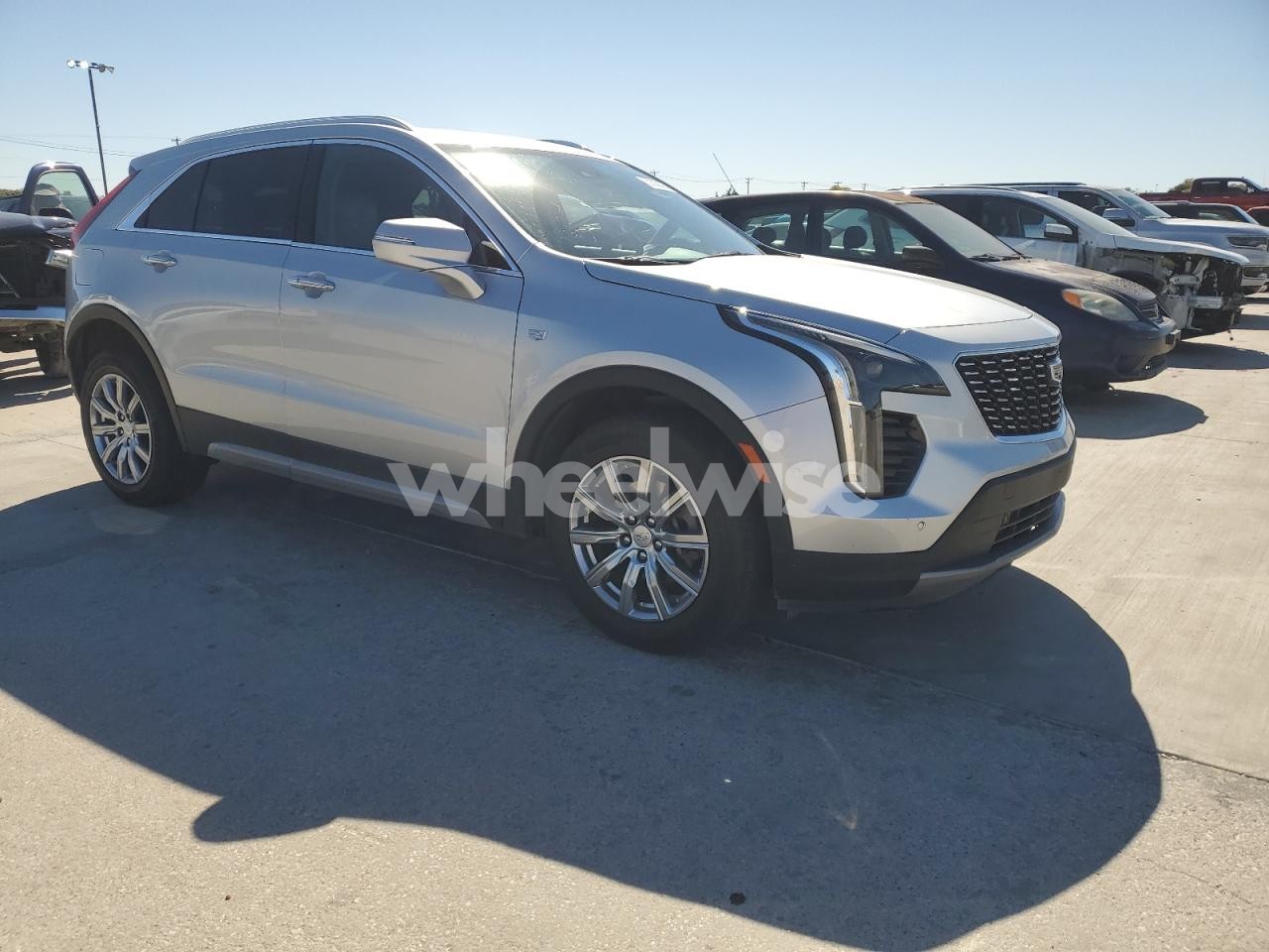 Photo 4 of 2022 CADILLAC XT4 PREMIUM LUXURY (VIN 1GYFZDR42NF128106)