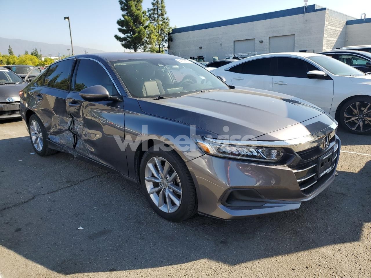 Photo 4 of 2021 HONDA ACCORD LX (VIN 1HGCV1F14MA075595)