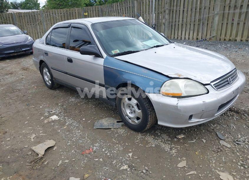 1999 Honda Civic LX (VIN 1HGEJ6571XL042988) main photo