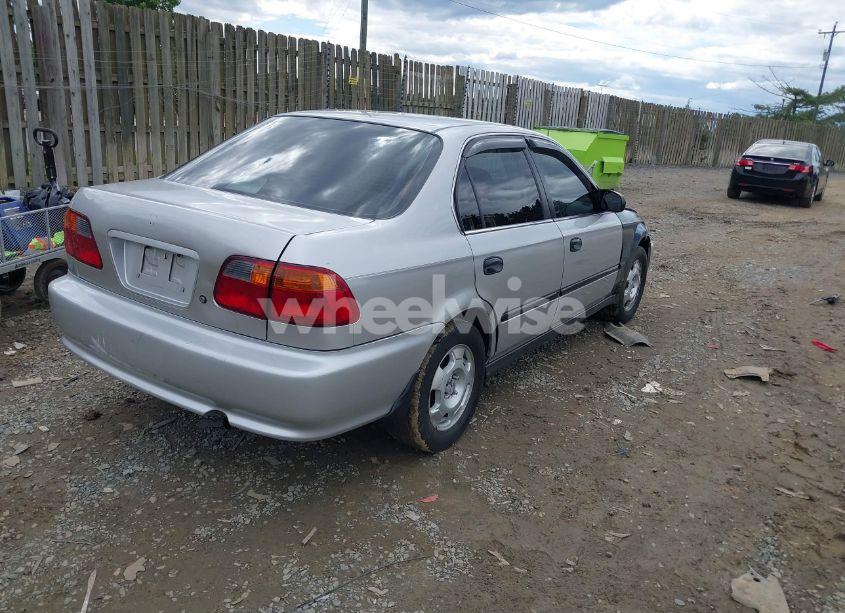 Photo 4 of 1999 Honda Civic LX (VIN 1HGEJ6571XL042988)
