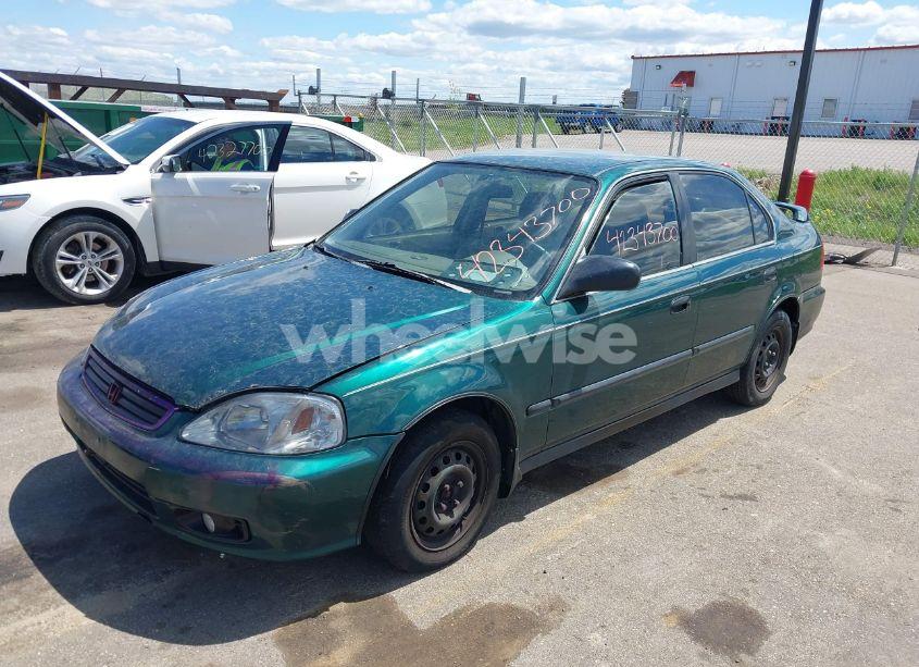 Photo 2 of 1999 Honda Civic LX (VIN 1HGEJ6672XL044666)