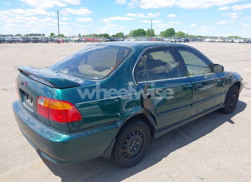 Photo 4 of 1999 Honda Civic LX (VIN 1HGEJ6672XL044666)