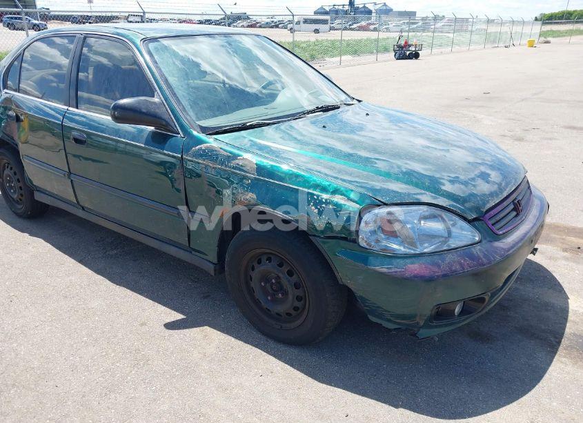 Photo 6 of 1999 Honda Civic LX (VIN 1HGEJ6672XL044666)