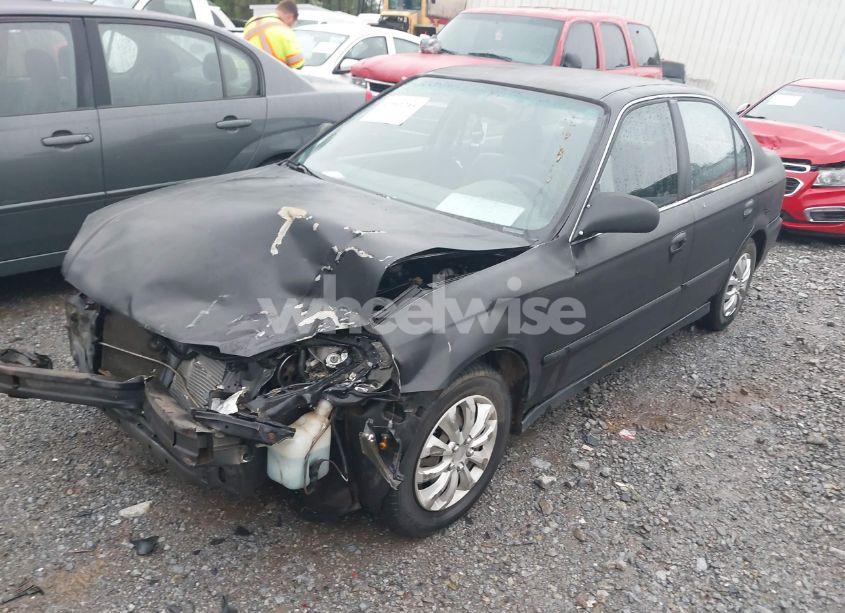 Photo 2 of 2000 Honda Civic LX (VIN 1HGEJ6674YL005143)