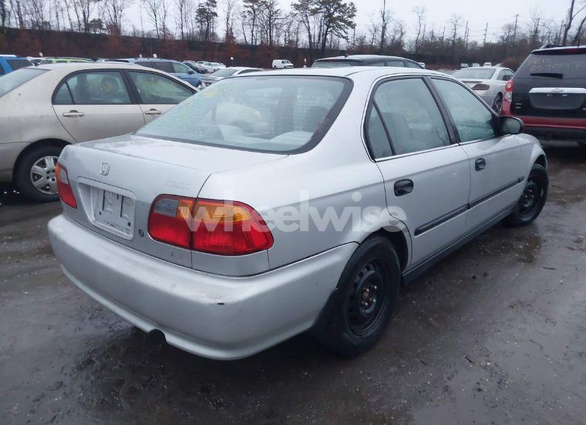 Photo 4 of 1999 Honda Civic LX (VIN 1HGEJ6676XL026011)